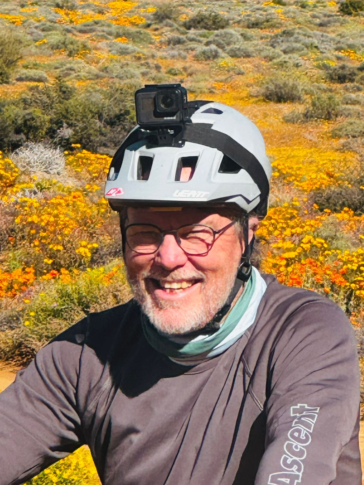 Brian on Bike in Flowers of Namaqualand